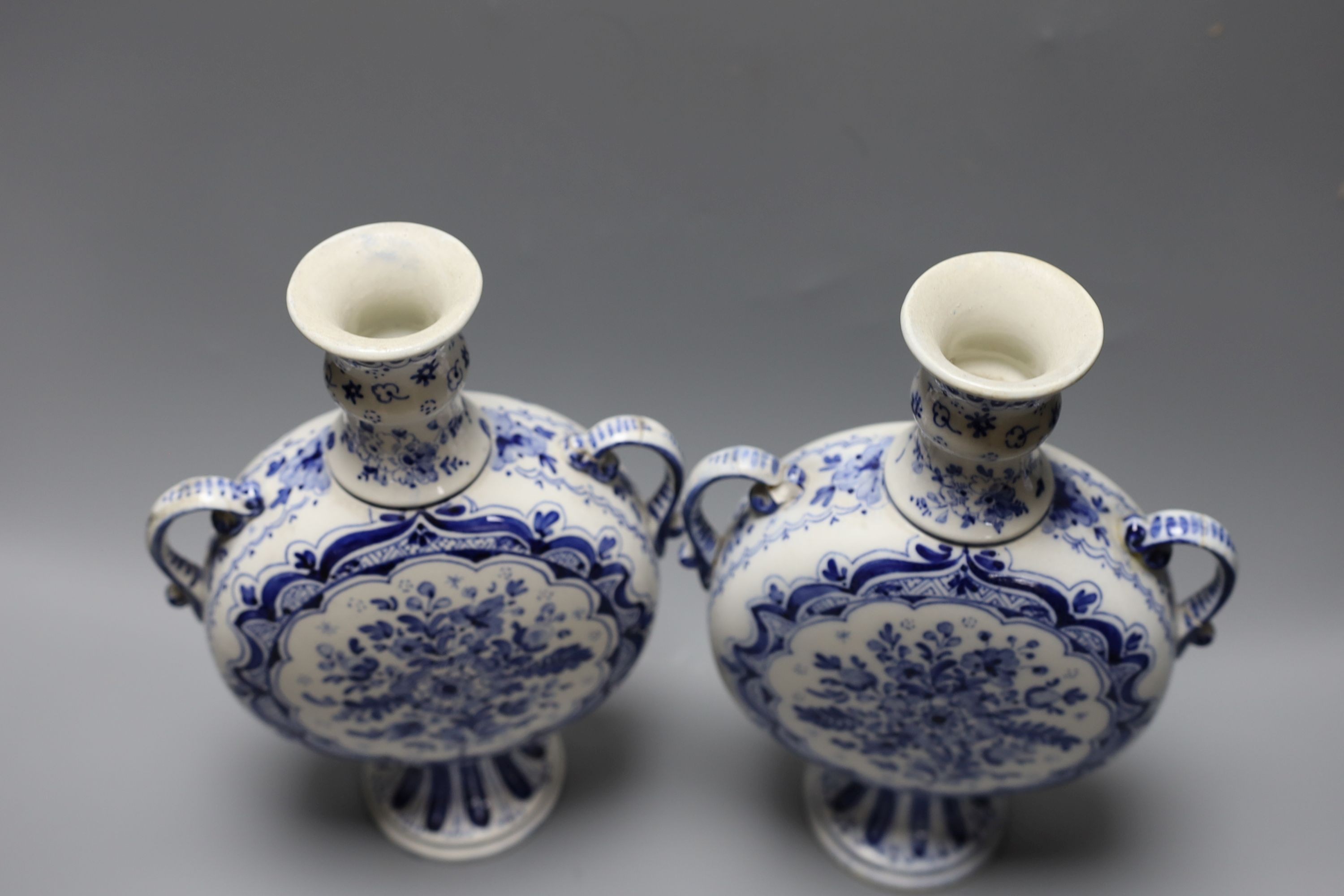 A pair of 19th century Delft vases 26cm